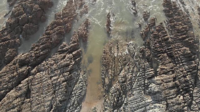 Overhead View Breaking Waves Over Rocks, North Devon, West Coast UK