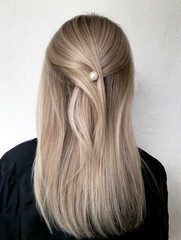 Naklejka premium Long blond hair with balayage 