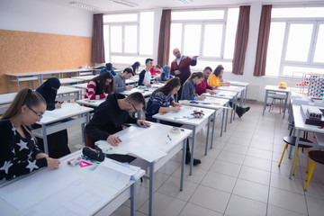 Male Professor Holding Lecture to Multi Ethnic Group of Students. Smart Young People Studying at the University.