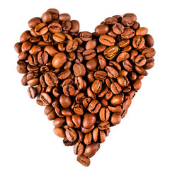 Heart made of coffee beans isolated on a white background. Top view.