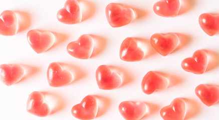 Pink heart shaped gummies pattern.