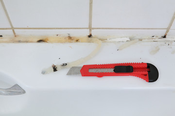 Bathroom renovation, old silicone removal