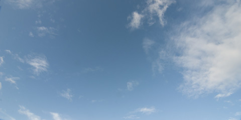 Naklejka na ściany i meble Atmospheric sky art image. White Cumulus cloud in a light blue sky. Australia.
