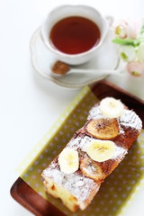 Homemade banana cake on plate with copy space