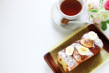 Homemade banana cake on plate with copy space