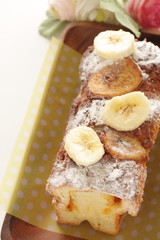 Homemade banana cake on plate with copy space