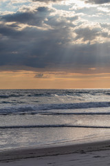 Obraz premium Majestic beach sunrise seascape at Costa del Sol, El Salvador, Central America. Pacific Ocean. Vertical.