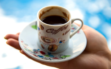 a cup of coffee in the hands