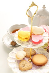 Heart shaped candy and cookie for afternoon tea image