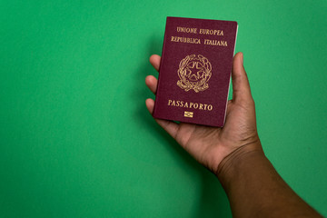 Black person with official Italian passport - obrazy, fototapety, plakaty