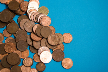 5 cents coins with blue background. Copper coins