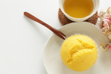 yellow steamed bun on dish for lemon cake image
