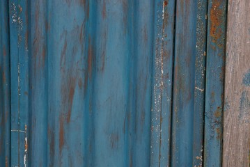 blue metal texture from an old dark shabby iron wall