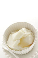 honey and yogurt on white background for healthy dessert
