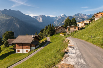 Fototapeta na wymiar wooden huts in Braunwald village in Glarus Alps, Switzerland