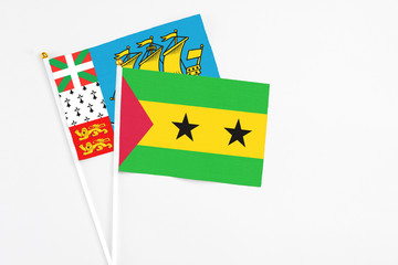 Sao Tome And Principe and Saint Pierre And Miquelon stick flags on white background. High quality...