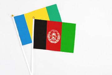 Afghanistan and Saint Vincent And The Grenadines stick flags on white background. High quality...
