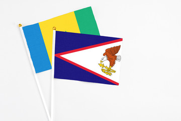 American Samoa and Saint Vincent And The Grenadines stick flags on white background. High quality...