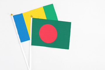 Bangladesh and Saint Vincent And The Grenadines stick flags on white background. High quality...