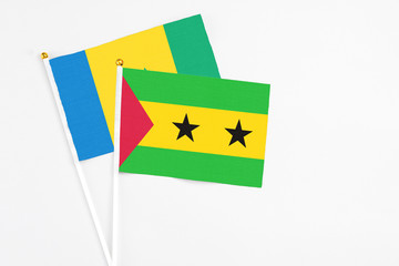 Sao Tome And Principe and Saint Vincent And The Grenadines stick flags on white background. High...