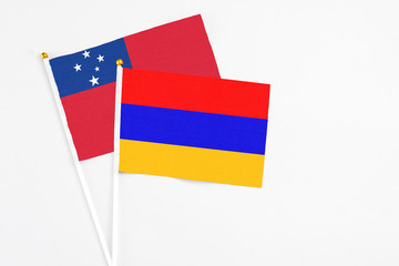 Armenia and Samoa stick flags on white background. High quality fabric, miniature national flag....