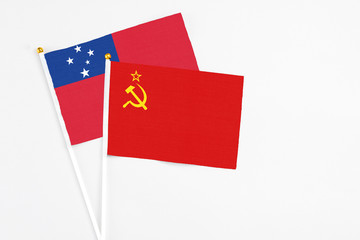 Soviet Union and Samoa stick flags on white background. High quality fabric, miniature national flag. Peaceful global concept.White floor for copy space.