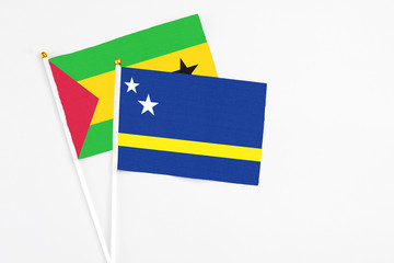 Curacao and Sao Tome And Principe stick flags on white background. High quality fabric, miniature...