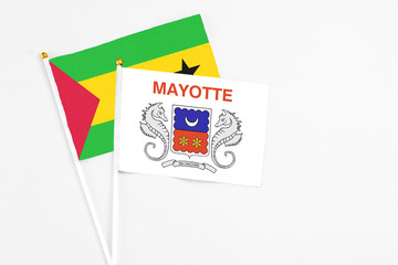 Mayotte and Sao Tome And Principe stick flags on white background. High quality fabric, miniature...