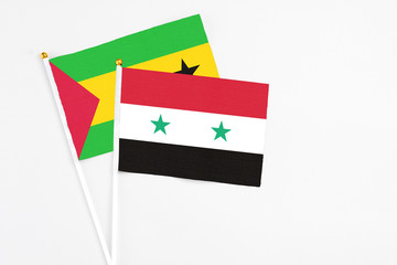 Syria and Sao Tome And Principe stick flags on white background. High quality fabric, miniature...