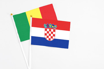 Croatia and Senegal stick flags on white background. High quality fabric, miniature national flag....