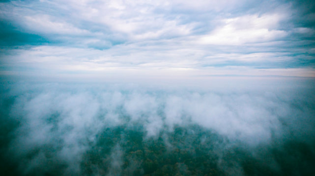 aerial top view from drone see white cumulus cloud and cloudscape. Conceptual business illustration.
