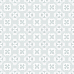 Seamless pattern vector, repeating white and gray geometric shapes on gray background. Trend modern design pattern background.