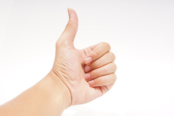 Hand sign thumb up - isolated white background