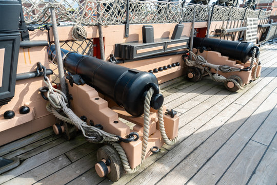PORTSMOUTH, ENGLAND - 6 October 2019: Old vintage cannon of HMS Victory the historical battleship or warship at Portsmouth Historic Dockyard.