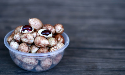Bambara groundnut or Vigna subterranea (Kacang Bogor) on wood background.