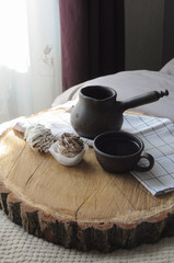 Homemade marshmallow zephyr with clay cup of coffee