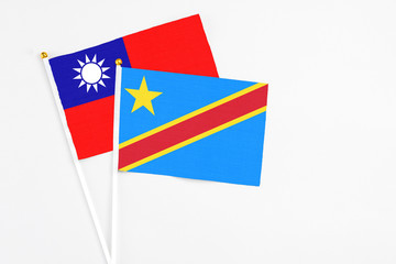 Congo and Taiwan stick flags on white background. High quality fabric, miniature national flag. Peaceful global concept.White floor for copy space.