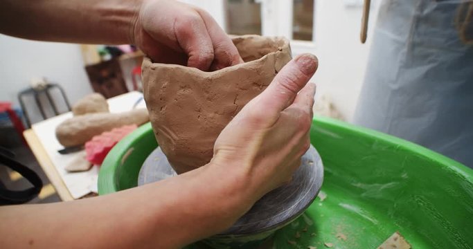 Clay craft modeling lesson. Female sculptor teach how to apply material and create round form. Modern system training, online courses. Creative classrom for modelling sculptures. Freelance lifestyle.