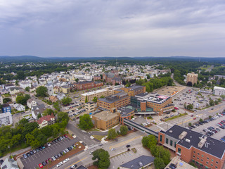 Fototapeta na wymiar Manchester historic downtown and Elm Street with Merrimack River at the background aerial view, Manchester, New Hampshire, NH, USA.