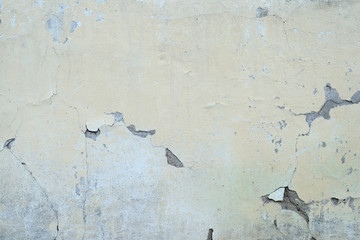 Fragment of an old cracked wall closeup of an abandoned house. Abstract background