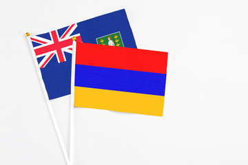Armenia and British Virgin Islands stick flags on white background. High quality fabric, miniature national flag. Peaceful global concept.White floor for copy space.