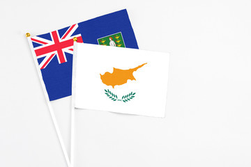 Cyprus and British Virgin Islands stick flags on white background. High quality fabric, miniature national flag. Peaceful global concept.White floor for copy space.