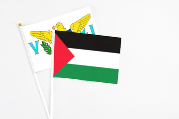 Palestine and United States Virgin Islands stick flags on white background. High quality fabric,...
