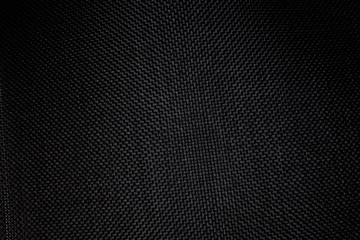 Black fabric texture background. Detail of canvas textile material