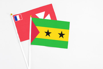 Sao Tome And Principe and Wallis And Futuna stick flags on white background. High quality fabric,...