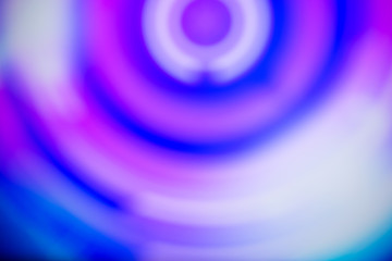 Blurred violet-pink abstraction with stripes. Texture closeup.