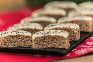 Fototapeta na wymiar Cakes for christmas. Sweet cakes at a bakery for Christmas eve. Christmas winter food composition