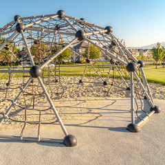 Square frame Urban climbing dome with nets in a kids playground