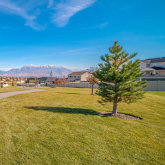 Square Paved walkway through a residential estate near sunset