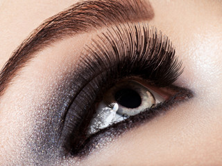  woman's eye with black eye makeup. Macro style image